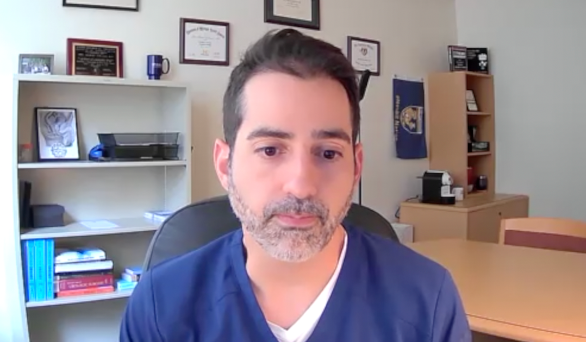 John Michael DiBianco, MD, answers a question during a Zoom video interview
