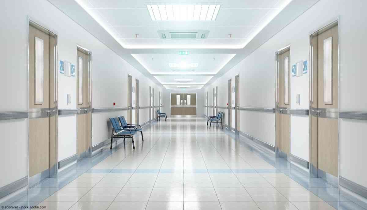 Long hospital bright corridor with rooms and seats 3D rendering | Image Credit: © sdecoret - stock.adobe.com 