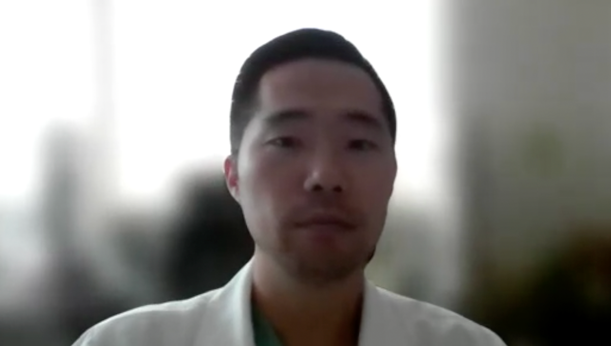 Ziho Lee, MD, answers a question during a Zoom video interview